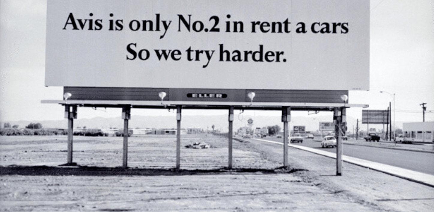 advert for Avis. Text reads 'Avis only No.2 for car rentals. So we try harder.'